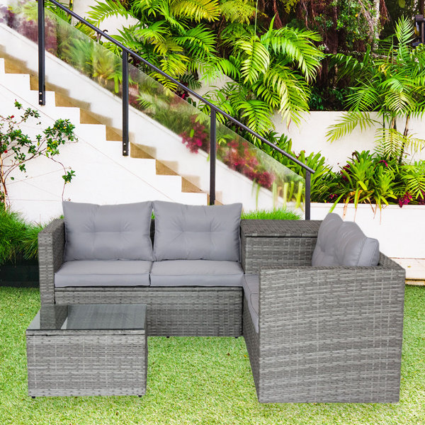 Latitude Run® 4 Piece Rattan Sectional Seating Group with Cushions